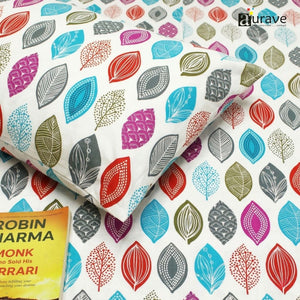 Close-up of 100% cotton bedsheet with multicolor leaf pattern, soft texture and skin-friendly fabric
