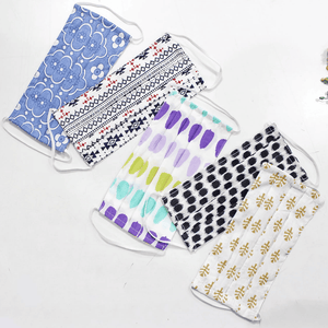 Full View Five fabric face masks with different patterns