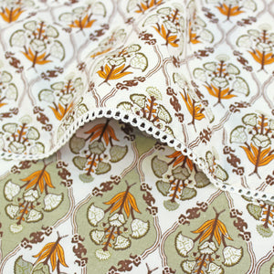 Close-up of patterned fabric with IRIS Designer Border Cotton Reversible Dohar, Mustard