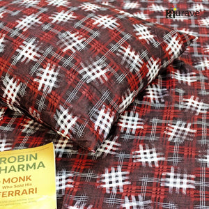 Detailed texture of 210TC cotton fabric showing the maroon, white, and blue abstract check print for kids bedding