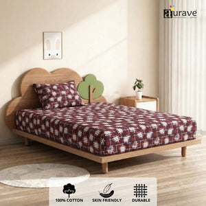 Corner edge view of single cotton bedsheet showing the smooth drape and modern red hashtag pattern