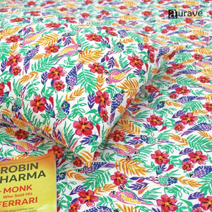 Detailed view of soft 100% cotton fabric showing bright red, pink, and yellow floral pattern for children's bedding