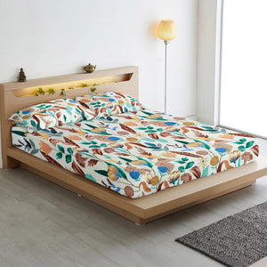 Fitted bedsheet set with on a bed