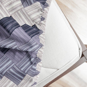 fitted bedsheets set with a geometric pattern in purple , elastic fit