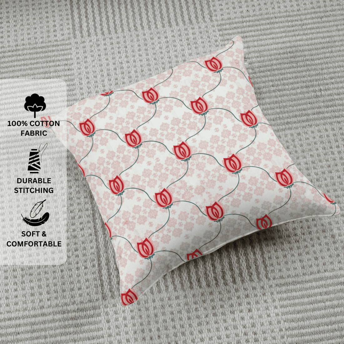 Decorative pillow with red floral pattern on a textured surface