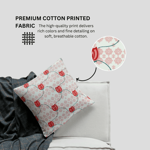 Decorative pillow with floral pattern on a bed, featuring premium cotton printed fabric.