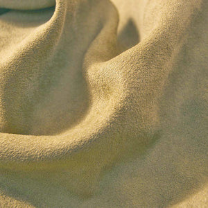 Close-up of sand with ripples and shadows