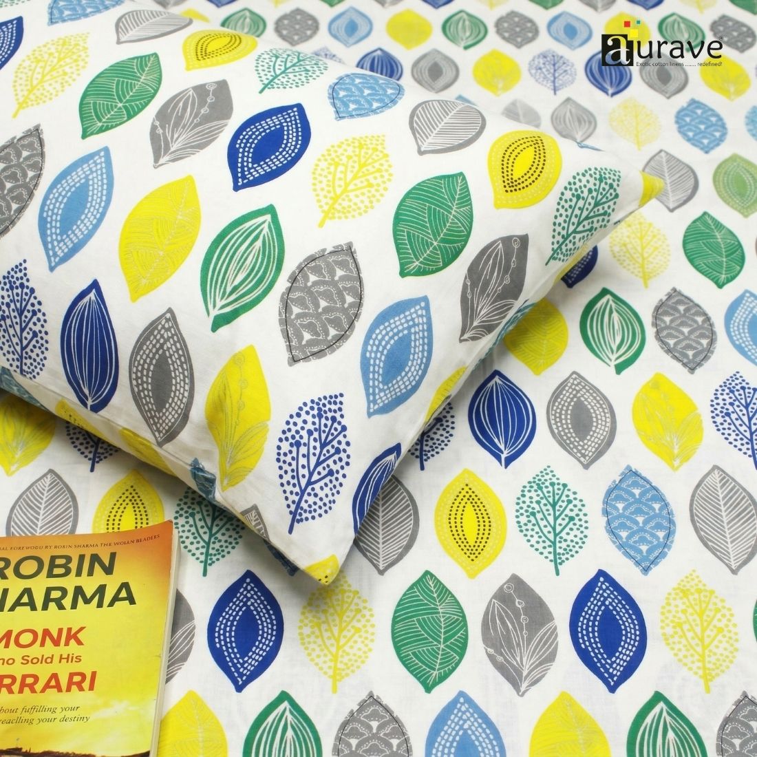 Close-up of 100% cotton bedsheet fabric 60x90 inches with colorful leaf print, soft and skin-friendly