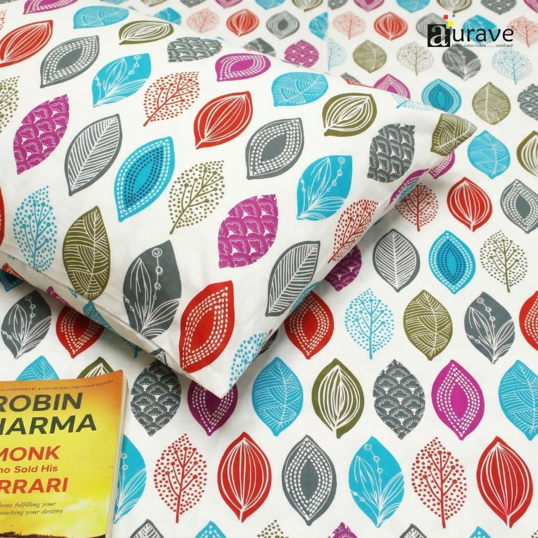 Close-up of 100% cotton bedsheet with multicolor leaf pattern, soft texture and skin-friendly fabric