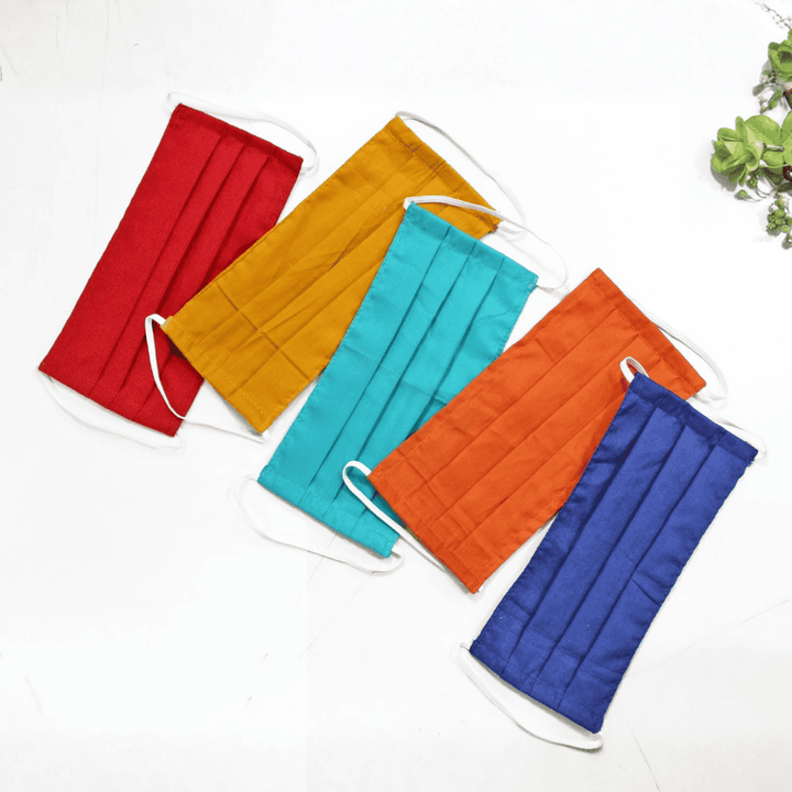 Five colorful face masks in red, yellow, blue, orange, and green 