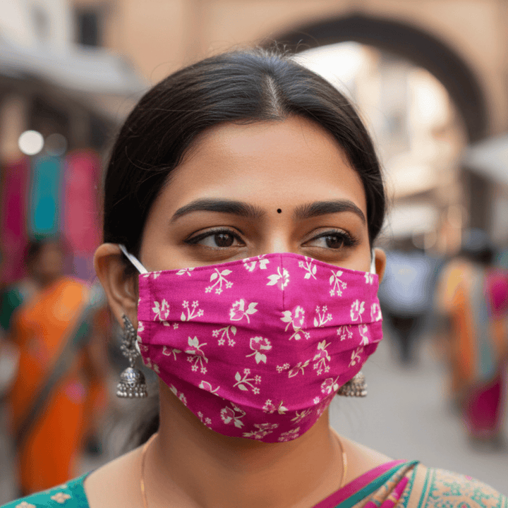 Woman wearing pink cotton pleated face mask