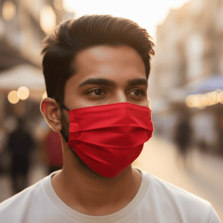 Man wearing a red face mask 