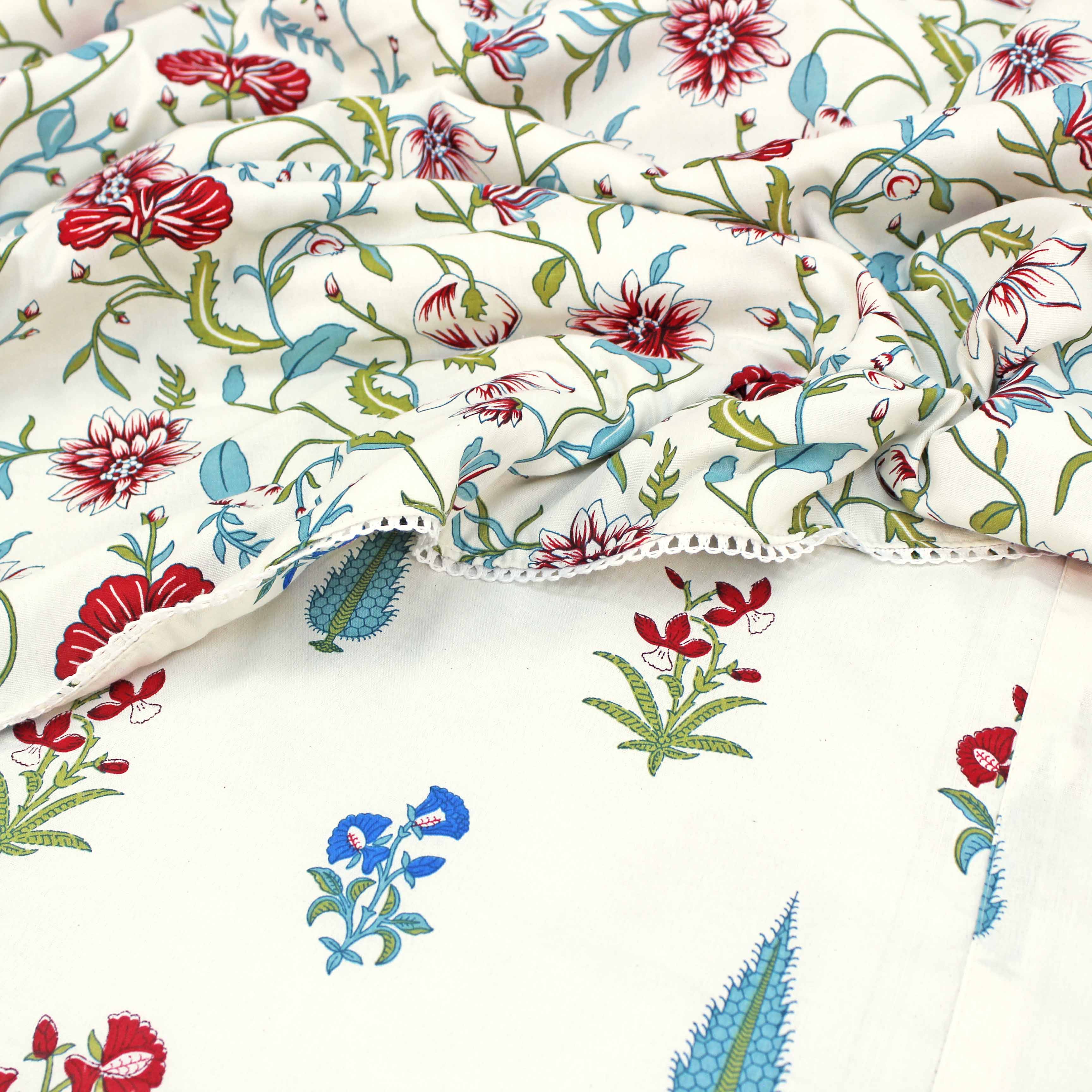 Close-up of Aurave cotton reversible dohar with red and blue floral print and designer border