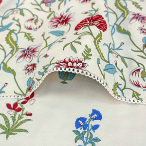 Close-up of Aurave cotton reversible dohar with red and blue floral print and designer border