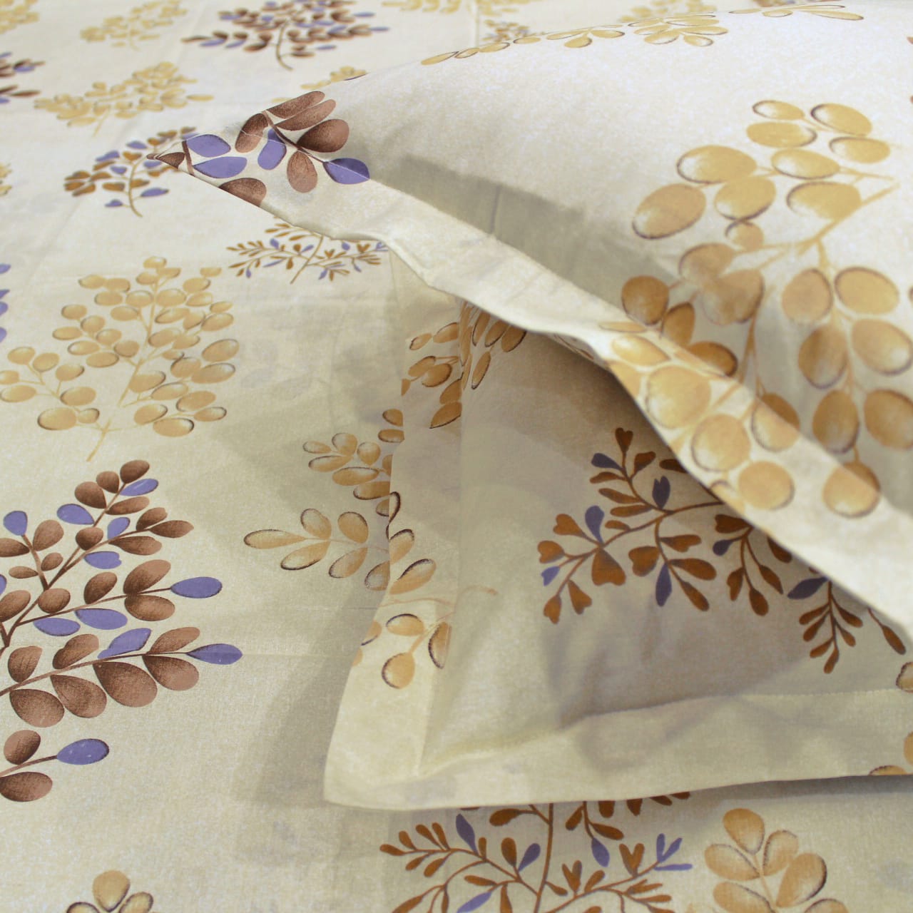 Close-up view Printed Floral Cotton 250 TC Fitted Bedsheet with Pillow Covers - Brown