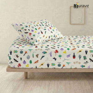 AURAVE kids single flat bedsheet and pillow cover featuring colorful wildlife, sea creatures, and nature motifs on a crisp white background.