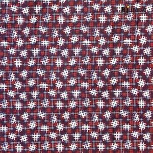Minimalist kids bedroom styled with a dark red geometric pattern 100% cotton single bedsheet on a wooden bed