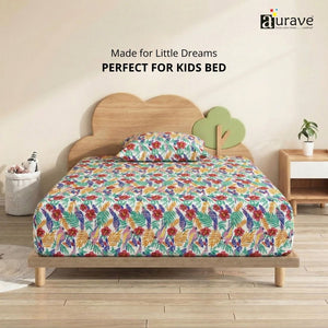 Close-up of 210 TC pure cotton single bedsheet and matching floral pillow cover on a modern kids bed