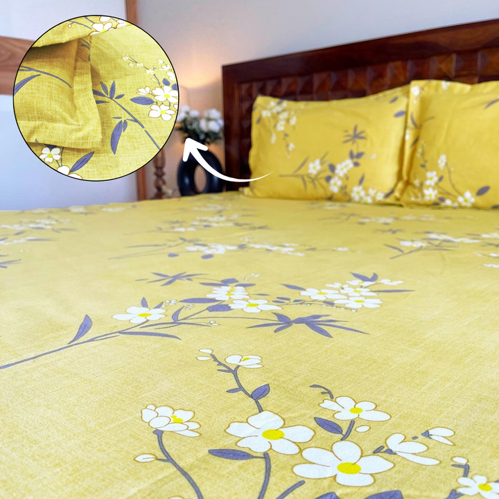 Floral 210 TC olive fitted bedsheet with matching pillow covers styled in a bright bedroom.