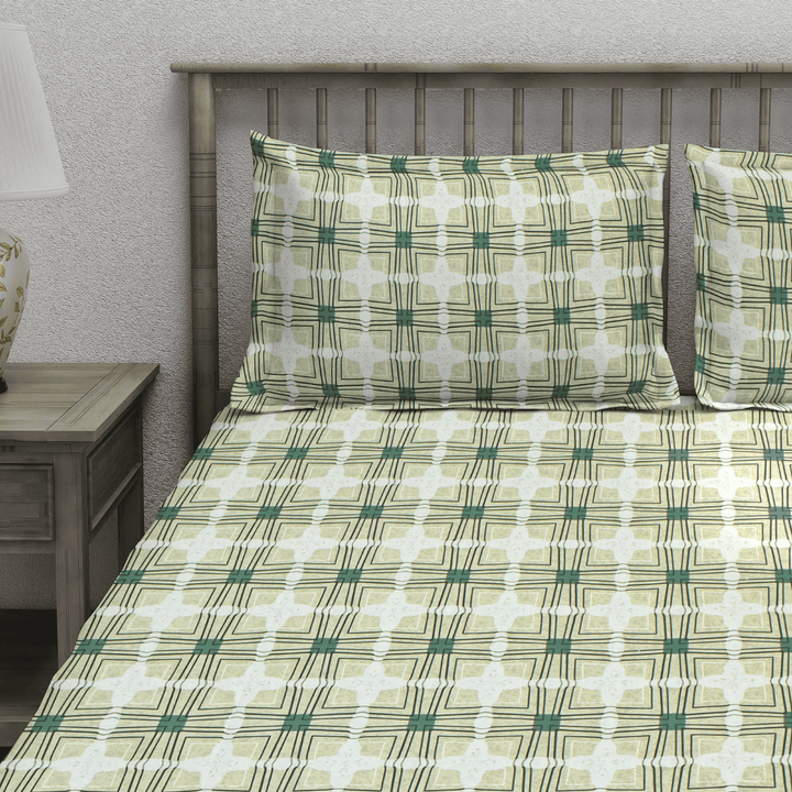 Cotton blend bedsheet featuring green grid design and matching pillow covers