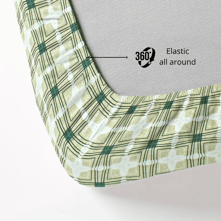 Cotton blend fitted bedsheet with green and beige geometric print and 360-degree elastic all around