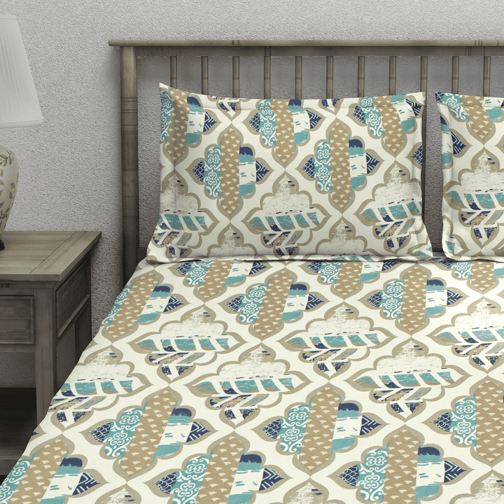 bedsheet with blue and beige abstract print with matching pillow covers