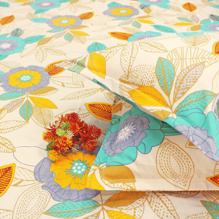 Cotton blend double bedsheet floral print and matching pillow cover, styled with decor