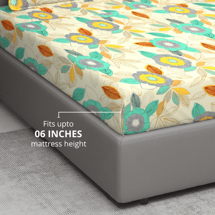 Cotton blend double bedsheet with teal and yellow floral print fits up to 6 inches mattress height
