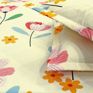 Close-up of a floral multicolor fitted bedsheets with pillow covers
