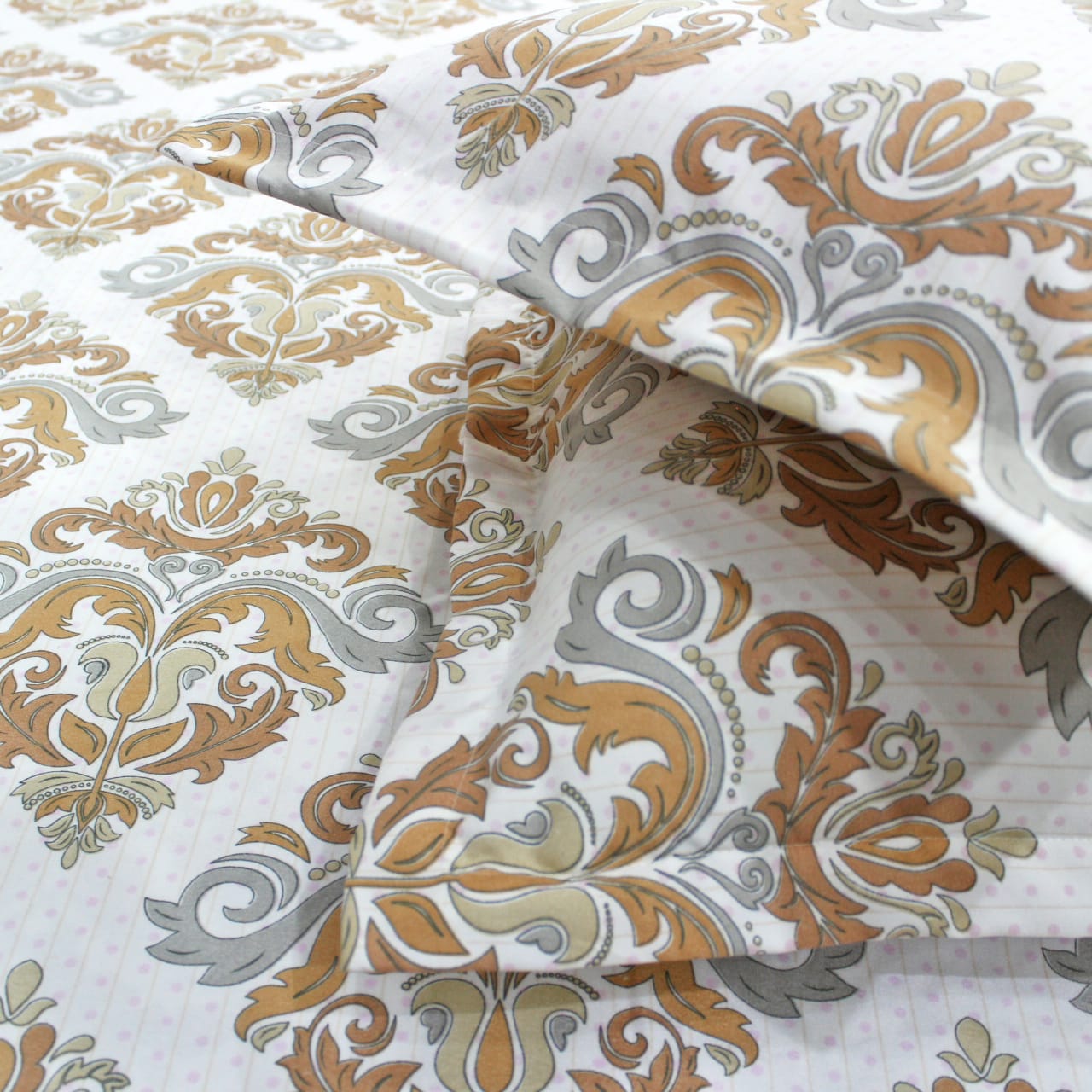 Close-up of a floral patterned fitted bedsheets with pillow covers