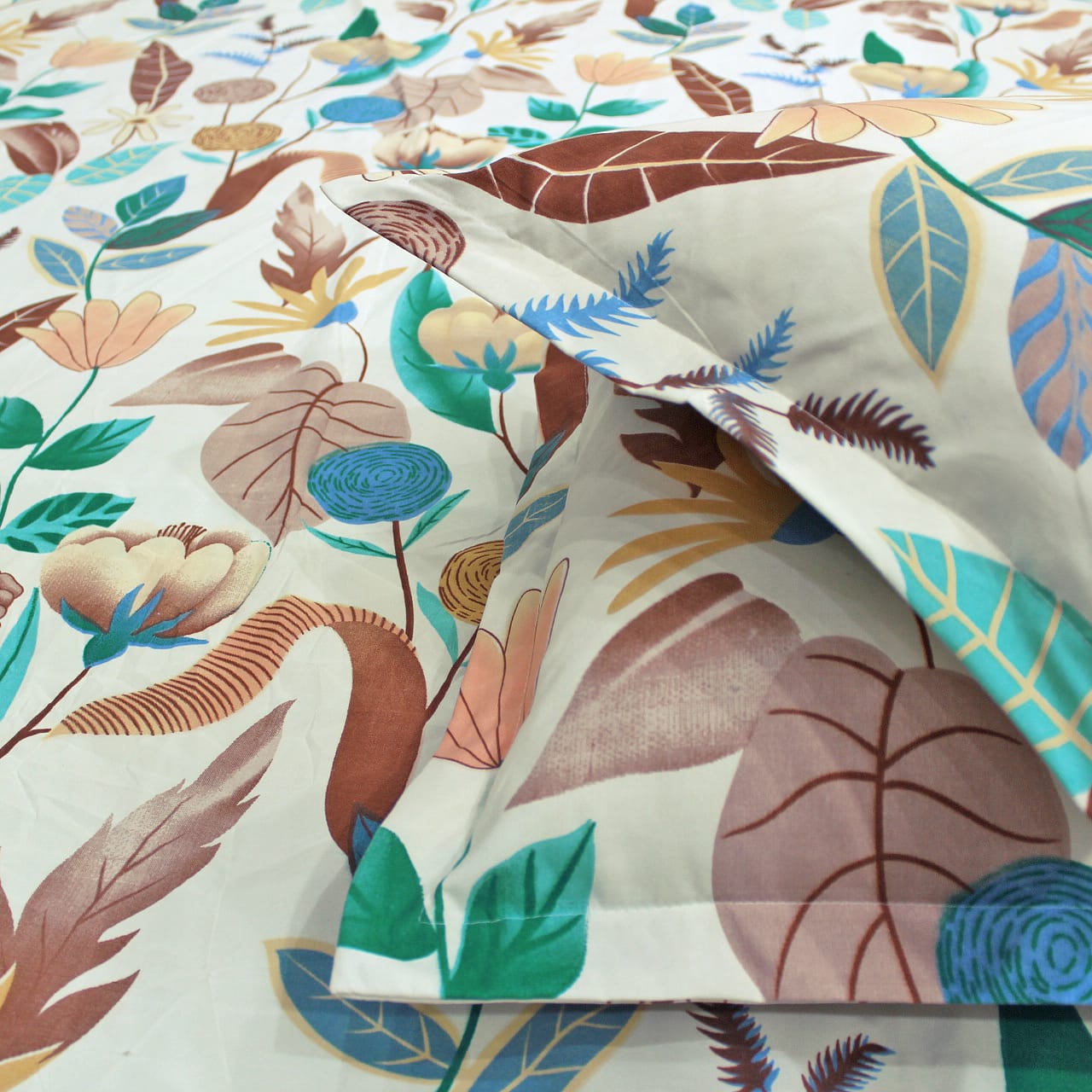 Close-up of a floral multicolor fitted bedsheets with pillow covers