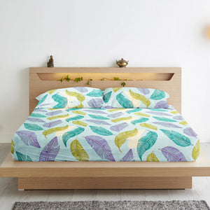 Floral cotton flat bedsheet with matching pillow covers.