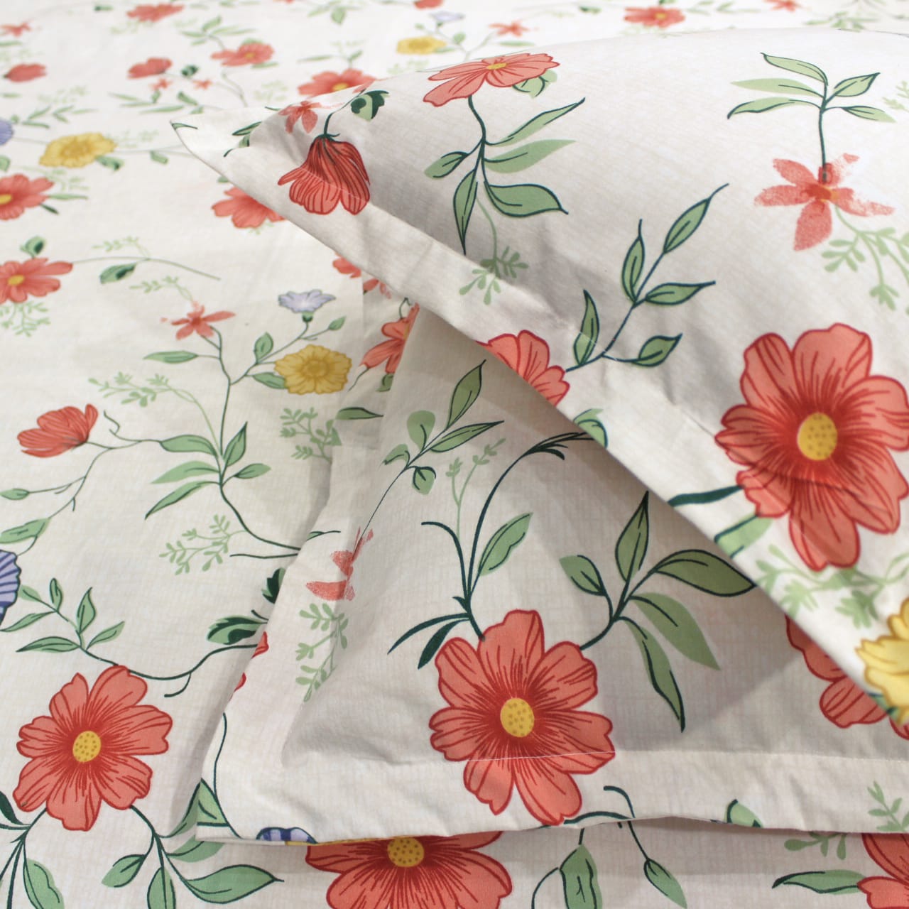 Close-up of a floral fitted bedsheet with pillow covers 