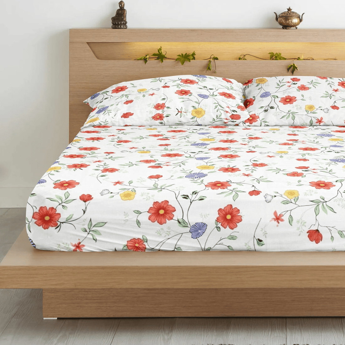king-size flat bedsheets with a multicolor floral design displayed 