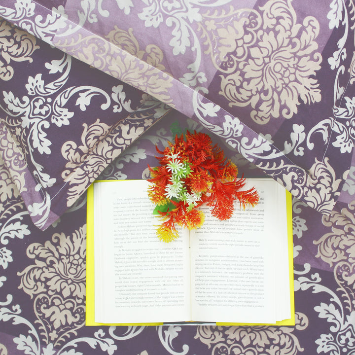 bedsheet in purple damask pattern with matching pillow covers