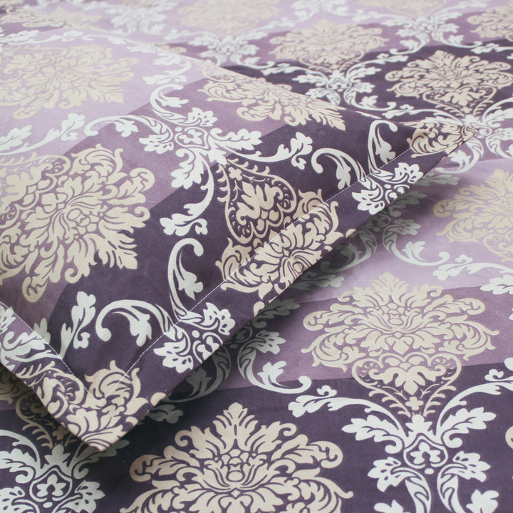 Luxury damask design in purple on soft cotton bedsheet with matching pillow cover