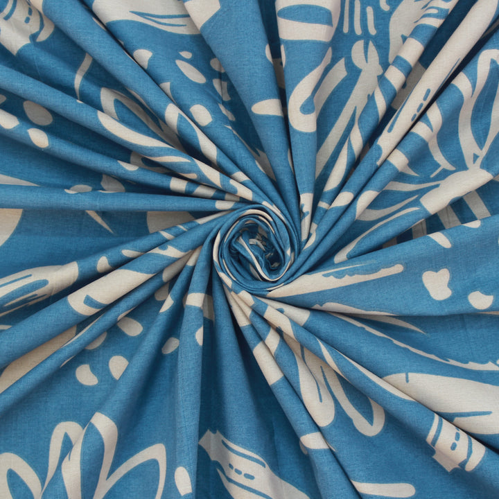 Close-up of blue floral 210 TC cotton bedsheet fabric