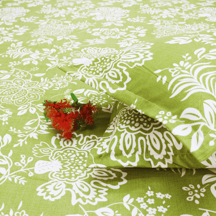 Close-up of Green Floral 210 TC flat bedsheet with pillow covers