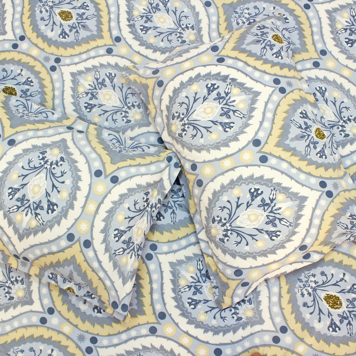 Cotton blend double bedsheet with blue and beige floral print and matching pillow covers