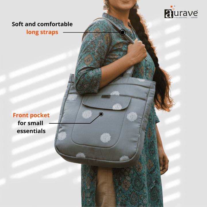 Woman holding a Shopper/Tote Bag, Grey