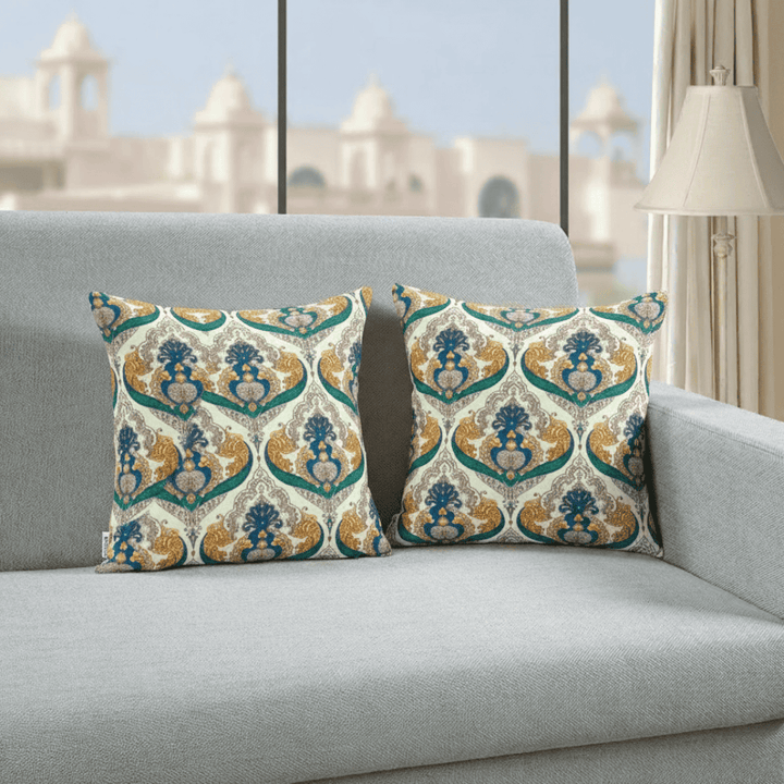 geometric pattern on a gray sofa in a room with large windows.