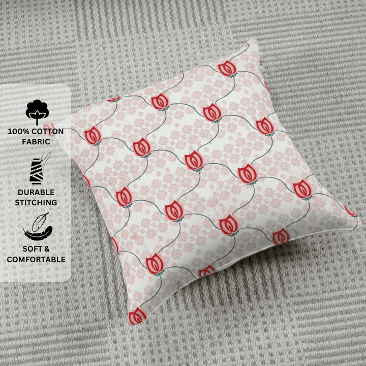 Decorative pillow with red floral pattern on a textured surface