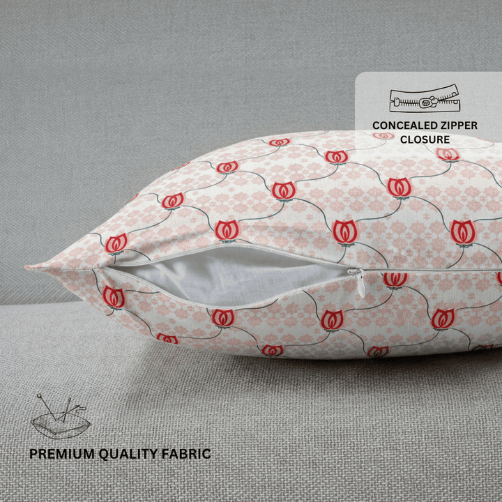 pillow with red floral pattern on featuring text about concealed zipper closure and premium quality fabric.