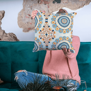 Blue and orange mandala printed cotton cushion cover adding vibrant touch to home décor