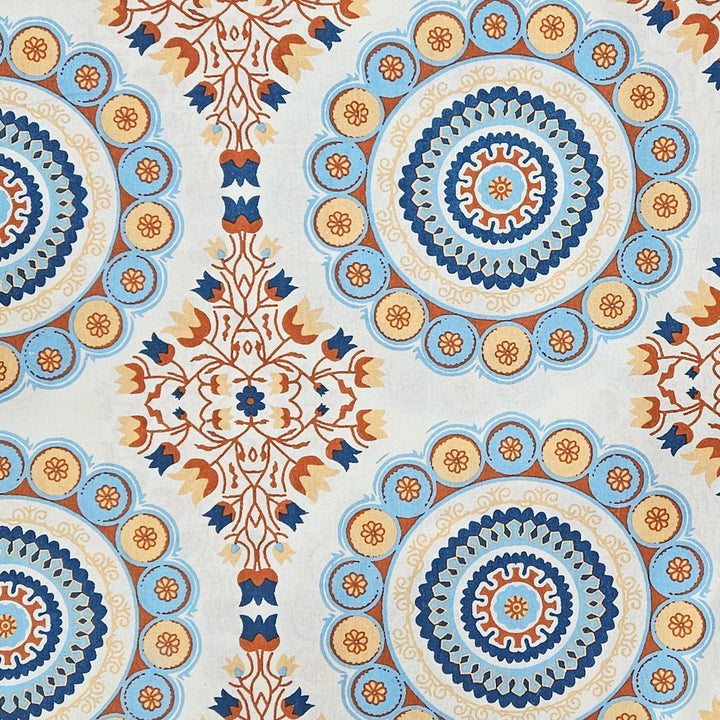 Decorative pattern with blue, orange, and beige colors on a white background