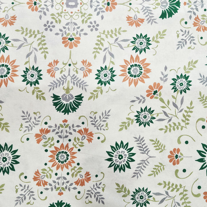 Elegant floral design in green and orange on cotton fabric for cushions and home décor