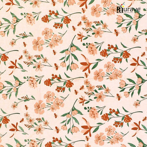 Close-up fabric texture of peach and orange floral print for AURAVE cotton pillow covers
