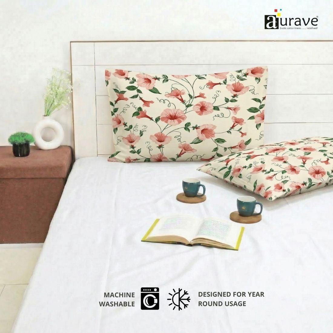 Eczema skin-friendly, zero color fading cotton pillow covers by AURAVE with precision stitching and a pink floral pattern.