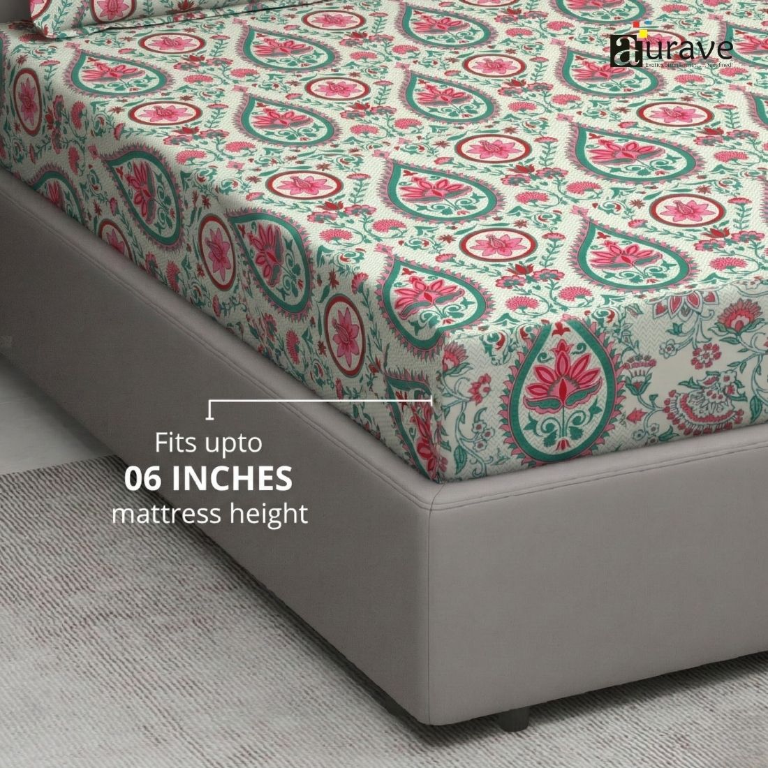 Patterned fitted bedsheet on a bed with 'AURAVE' branding and 06 inches mattress height compatibility.