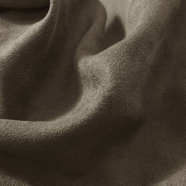 Close-up of textured brown fabric
